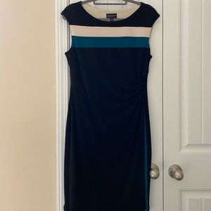 Flattering sleeveless very comfortable drape front dress, worn once!